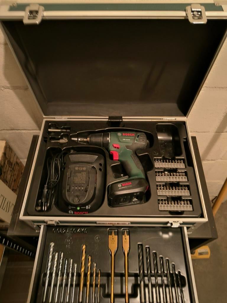 Bosch boormachine met oplader en 2 accu's, Ophalen