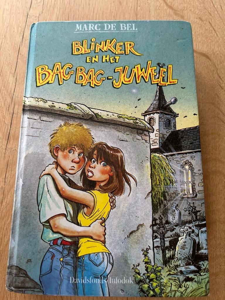Marc de Bel - Blinker en het BagBag-juweel, Boeken, Ophalen of Verzenden, Zo goed als nieuw, Marc de Bel