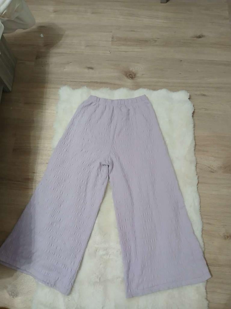 Paarse broek meisjes, Ophalen