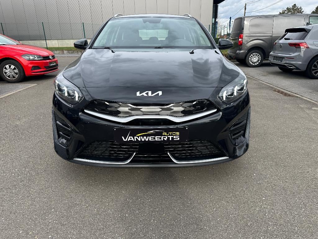 Kia Ceed SW 1.6 benz. +elektr. plug-in hybr, CARPLAY/ CAMERA, Auto's, Kia, Stof, Euro 6, USB, Zwart