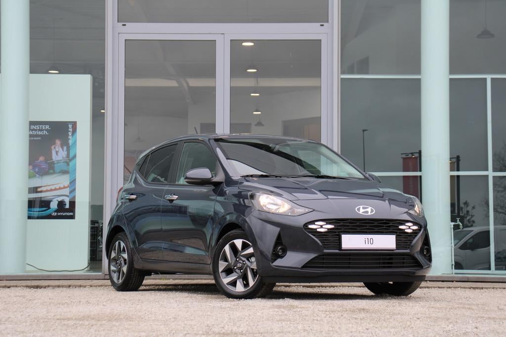 Hyundai i10 1.0 GDi Techno M5 *CAM*APPLE/ANDROID* (bj 2025), Auto's, Hyundai, Voorwielaandrijving, 116 g/km, Stof, Zwart