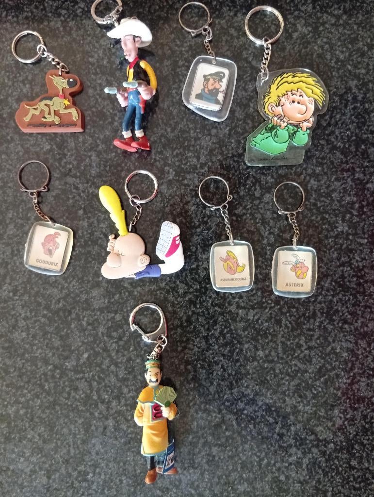 9 porte-clefs sur le thème de la bande dessinée (pièce/lot)., Enlèvement ou Envoi, Autres personnages, Neuf, Ustensile
