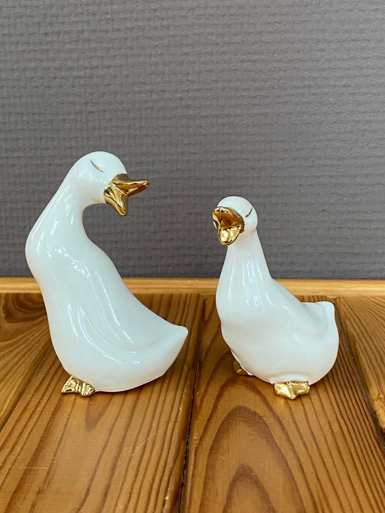 Twee porseleinen ganzenfiguren, Antiek en Kunst, Ophalen of Verzenden
