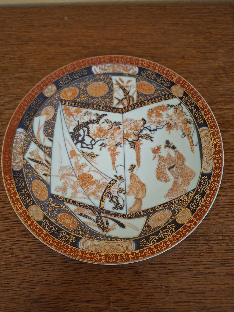 Assiette de présentation ronde en porcelaine, Enlèvement