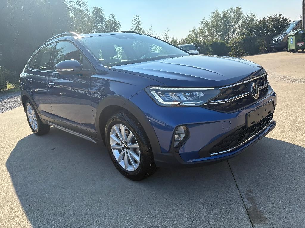 Vw Taigo 1.0 TSI Life Parkeersensoren + App Connect, Auto's, Voorwielaandrijving, Stof, 1200 kg, Blauw