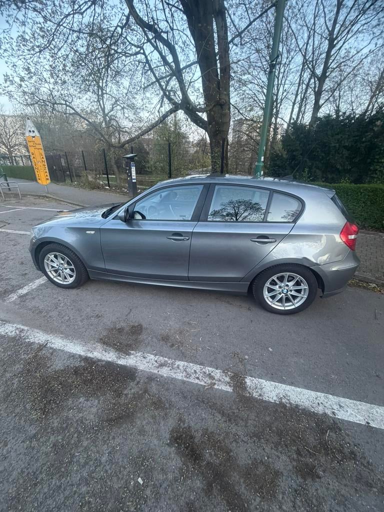 BMW 116i 2010, Auto's, BMW, Particulier, 1 Reeks, Achteruitrijcamera, Adaptive Cruise Control, Alarm, Bluetooth, Boordcomputer