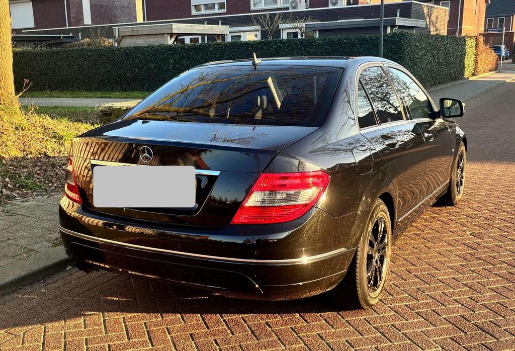 Zwarte Mercedes 180 C bouwjaar 2008, Auto's, Automaat, Stof, Zwart, Zwart