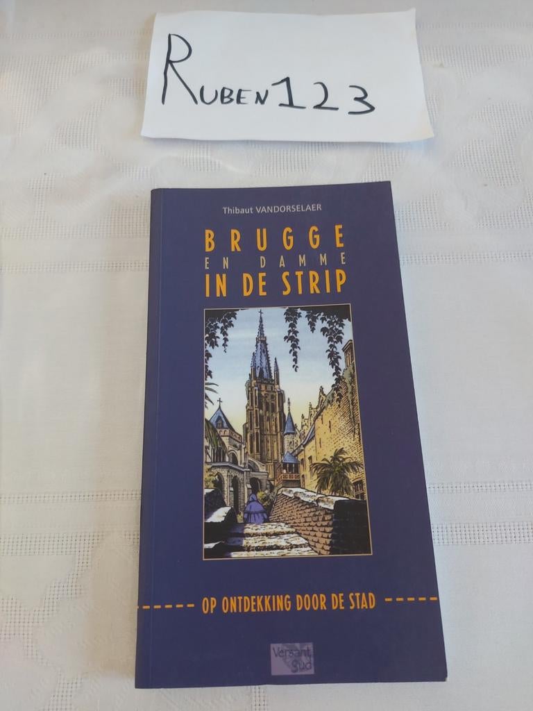 Brugge en Damme in de strip, Ophalen of Verzenden, Zo goed als nieuw
