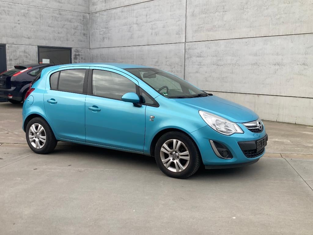 Opel Corsa 1.4 benzine 2012 met 107000km*airco*PARKEERSENSOR, Auto's, Opel, Euro 5, 4 cilinders, Blauw, Leder en Stof