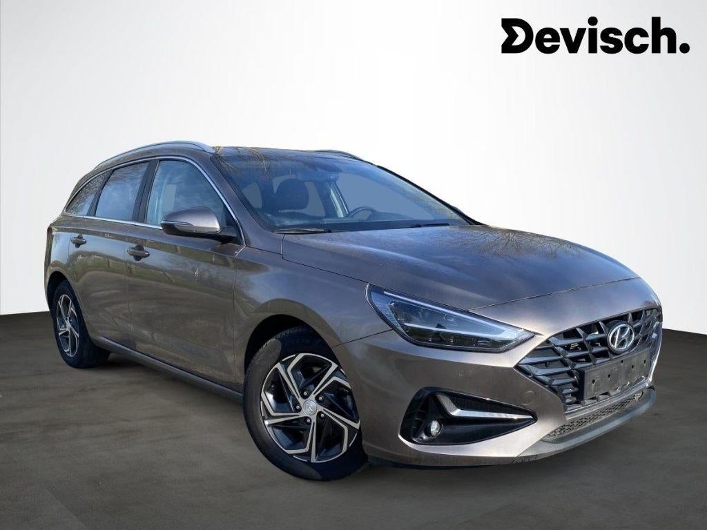 Hyundai i30 Wagon - Limited Edition Automaat, Auto's, Hyundai, Stof, Euro 6, Beige, Bedrijf
