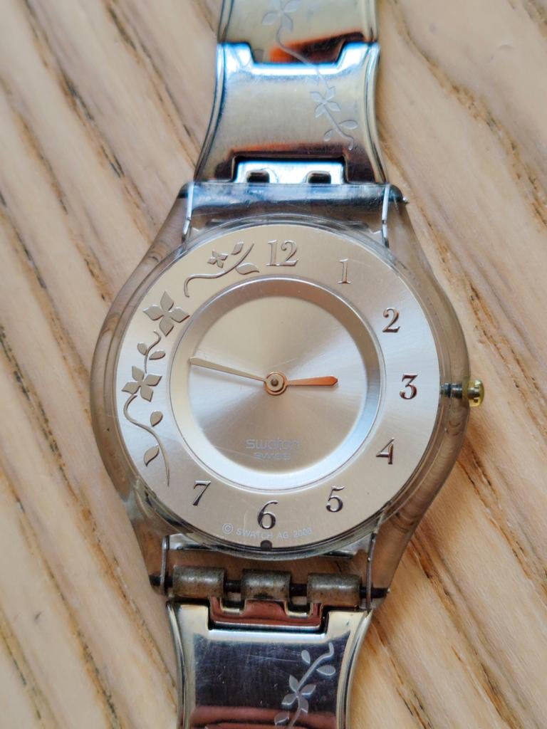 Swatch Skin Classic Climber Flowery 2006, Bijoux, Sacs & Beauté, Enlèvement, Swatch