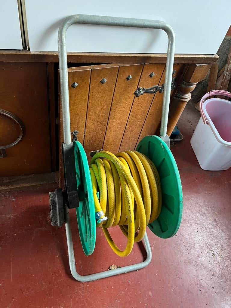 Tuinslang op haspel, Ophalen, Gebruikt, Tuinslang