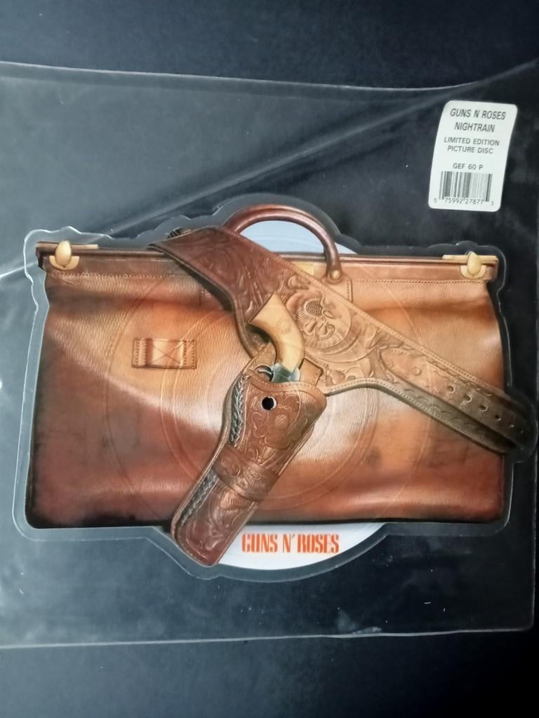 Guns & Roses shaped pic disc.