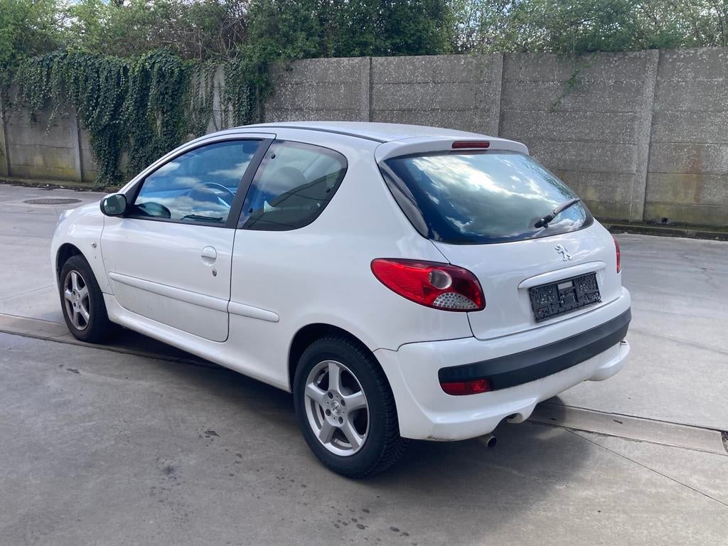Peugeot 206+ 1.4 benzine 2012 met 88000km*airco*garantie*, Auto's, Euro 5, Stof, 4 cilinders, Wit