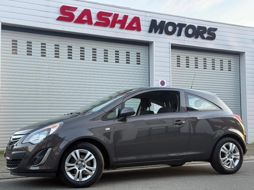 Opel Corsa 1.2 Benzine '14 | Navi | 97.000 KM | 12MGarantie, Voorwielaandrijving, Euro 5, Stof, Zwart