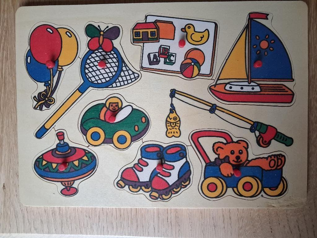 Houten inlegpuzzel, Ophalen