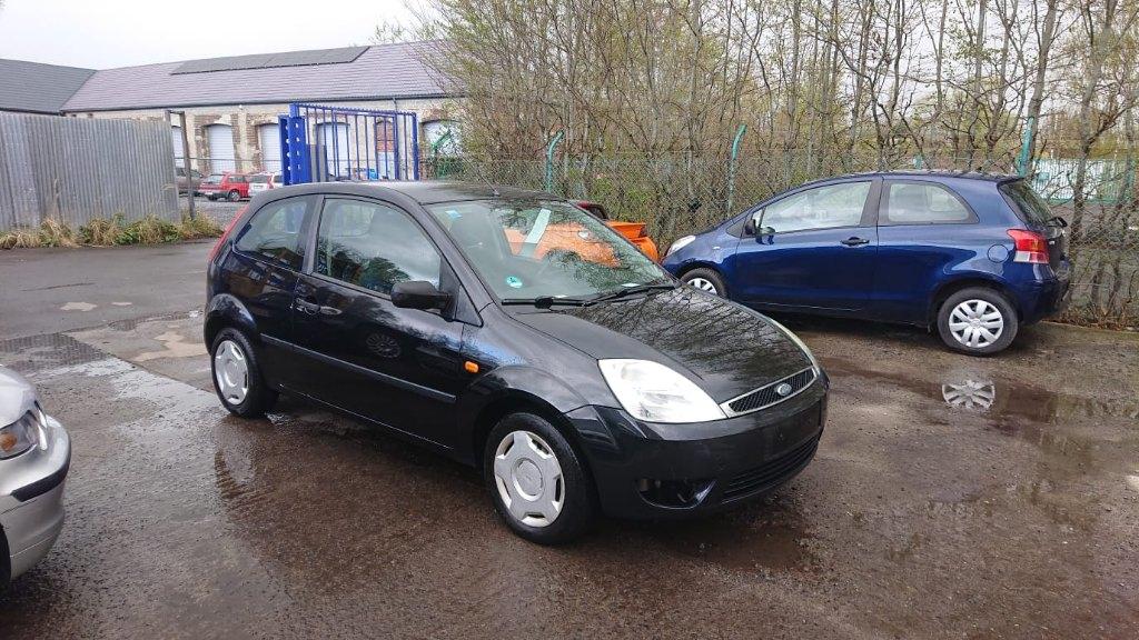 Ford Fiesta 1300cc essence 2005 164000km 1 prop clim GARANT, Auto's, Voorwielaandrijving, Stof, Zwart, Bedrijf