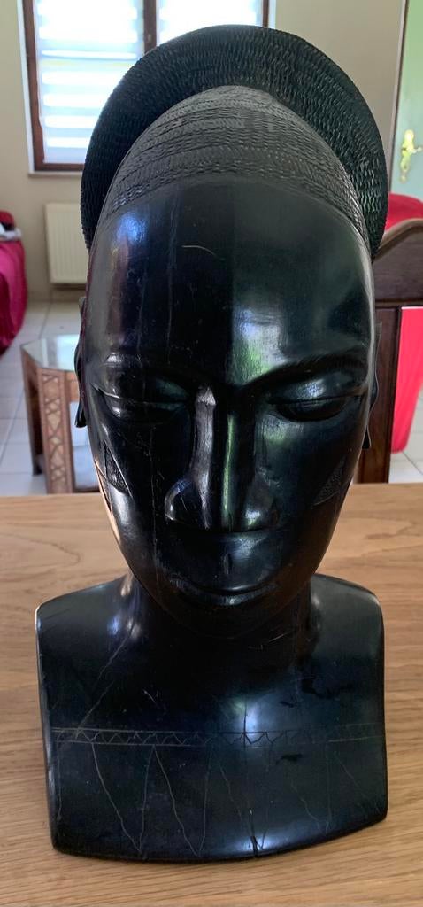 Sculpture de femme en ébène (41 cm), Enlèvement