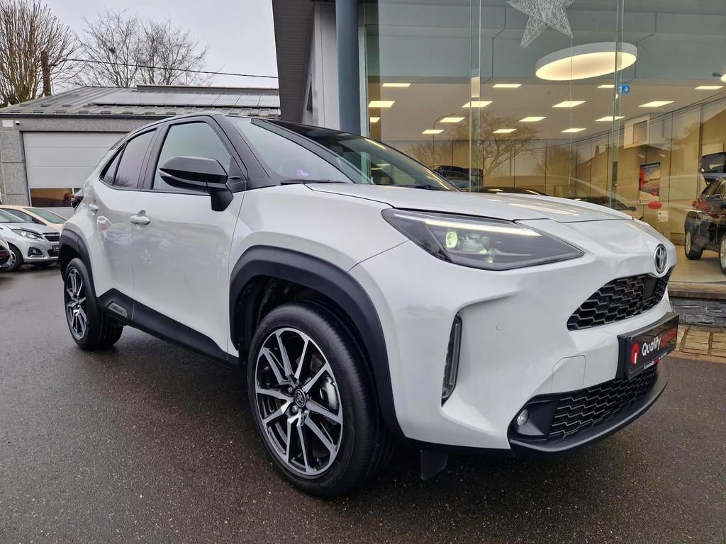 Toyota Yaris Cross GR Sport (bj 2023, automaat), Auto's, Toyota, Automaat, Gebruikt, 750 kg, Wit