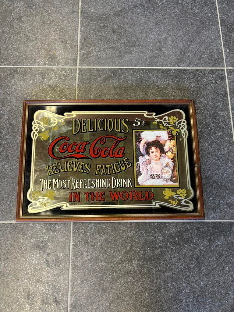 Coca-Cola spiegel uit de jaren 70, Ophalen