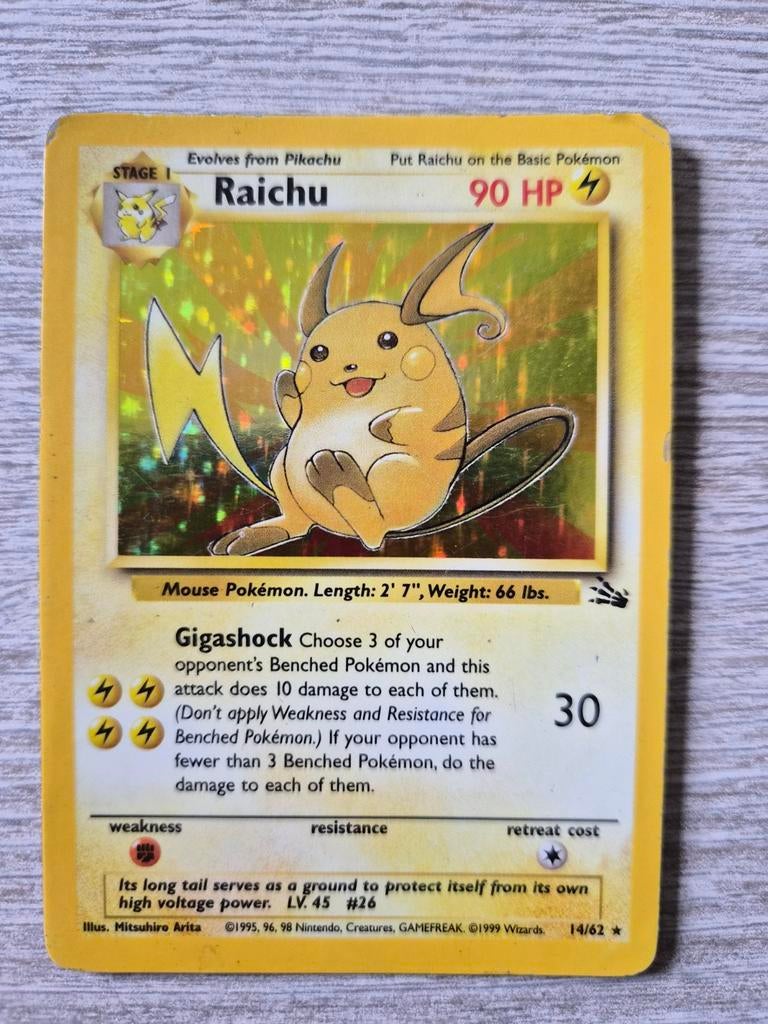 Raichu holo fossil 14/62, Hobby en Vrije tijd, Verzamelkaartspellen | Pokémon, Ophalen of Verzenden, Gebruikt, Losse kaart, Foil