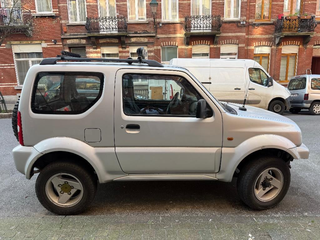 Suzuki Jimny 1.3 Essence 2003 – pour pièces ou projet, Autos, Suzuki, Argent ou Gris, Achat, Boîte manuelle, 2 portes