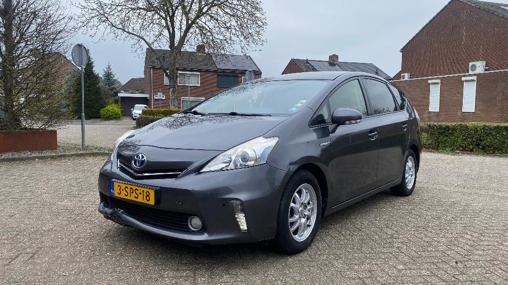 Toyota Prius Wagon 1.8 Aspiration, Auto's, Toyota, 4 cilinders, 7 zetels, Bedrijf, Hybride Elektrisch/Benzine