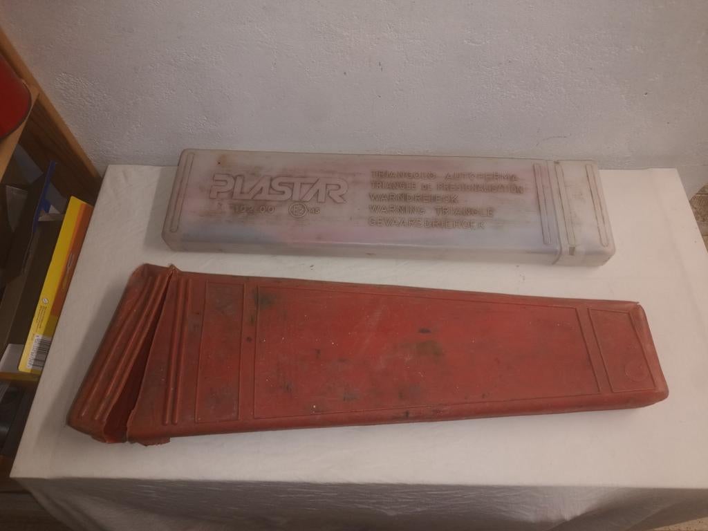 2 gevarendriehoek sets, Ophalen