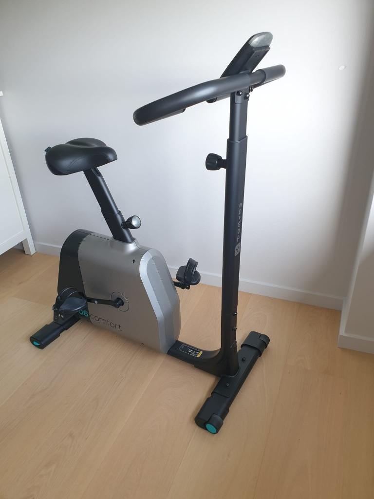 Vélo d'appartement DOMYOS Comfort (résistance motorisée), Sports & Fitness, Appareils de fitness, Comme neuf, Enlèvement, Métal