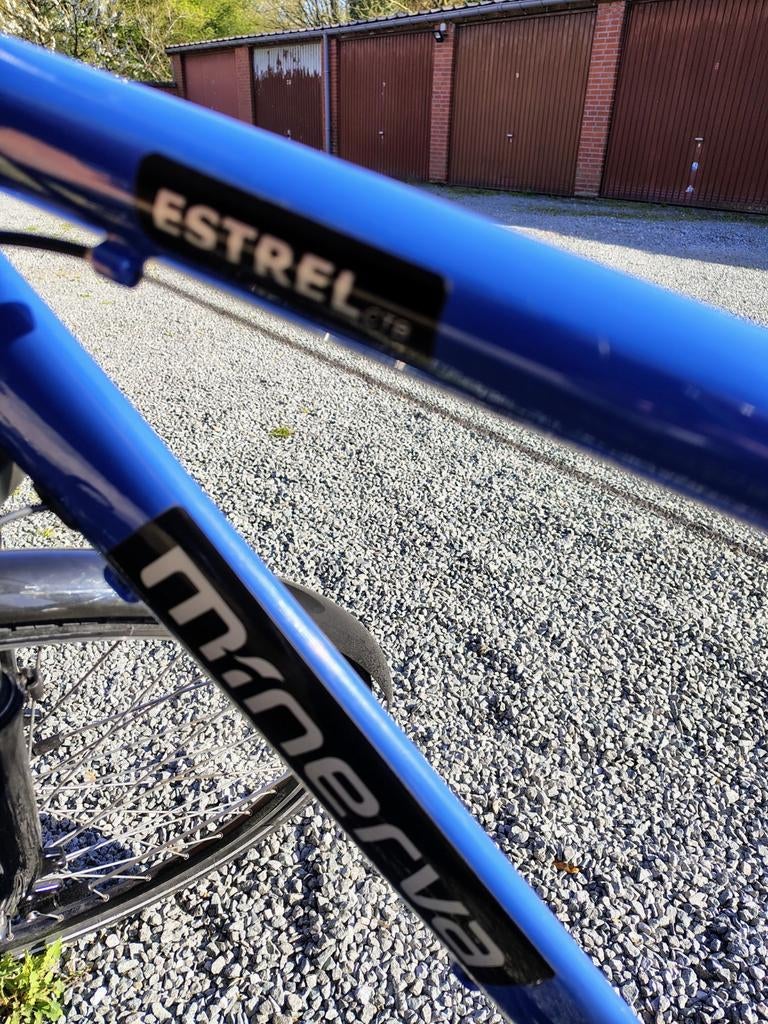 Minerva heren fiets met 1450 km , batterij nog 85% krasvrij, Ophalen