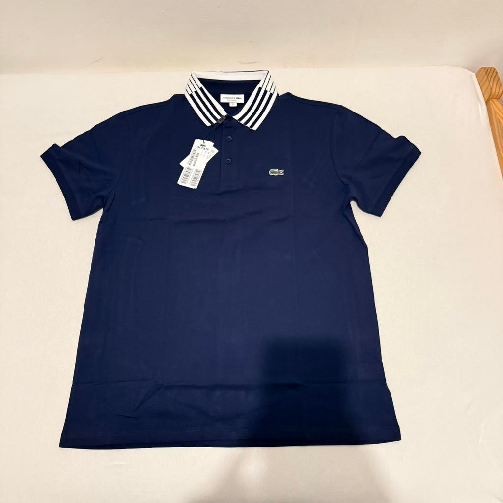 POLO LACOSTE BLEU MARINE, Enlèvement ou Envoi, Neuf, Taille 52/54 (L), Bleu