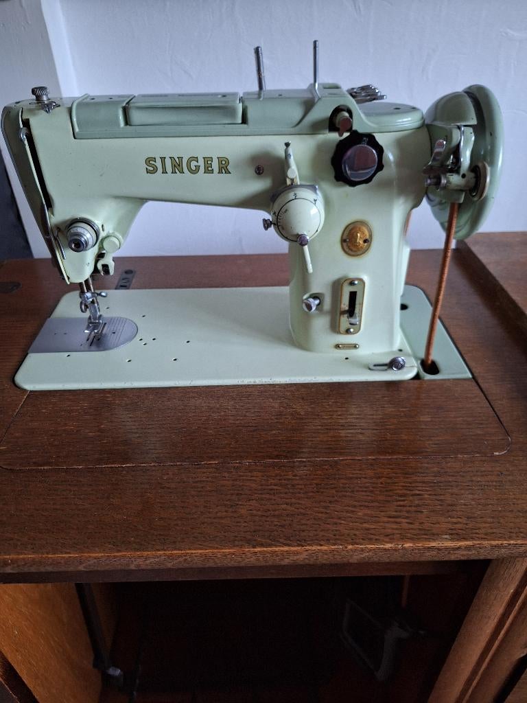 vintage Singer naaimachine, Ophalen