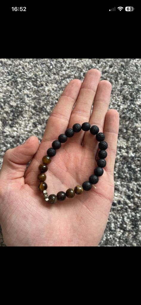 Armbandje man, Ophalen of Verzenden, Zo goed als nieuw, Zwart, Overige materialen