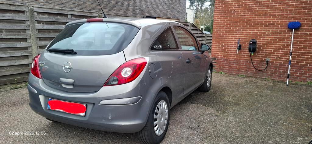 Opel corsa d 2010 benzine 1.2 euro 5, Auto's, Opel, Euro 5, Zwart, Bruin, Handgeschakeld