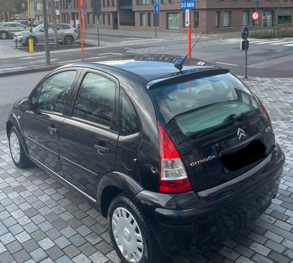 Citroën C3 1.1 benzine | 2009 | BLANCO GEKEURD VOOR VERKOOP, Auto's, Citroën, Voorwielaandrijving, Stof, Zwart, Handgeschakeld