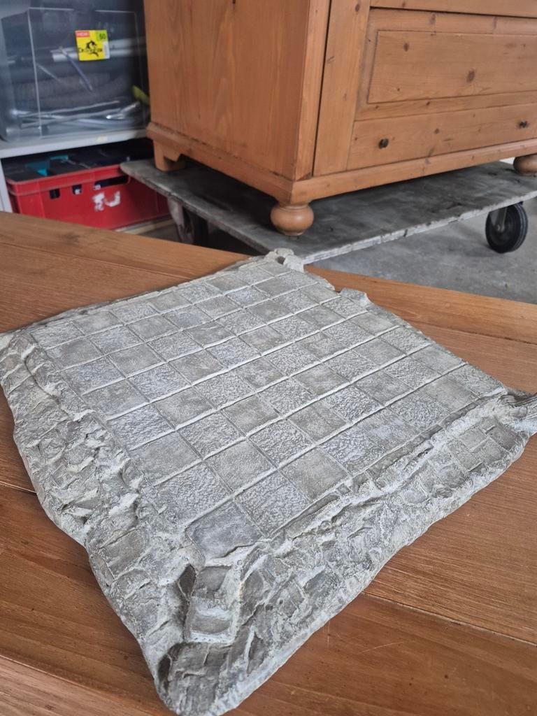 Zwaar stenen schaakbord, Ophalen