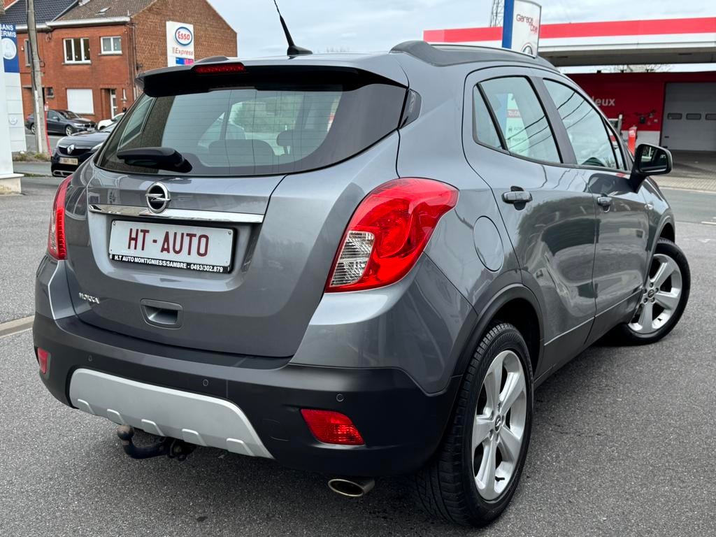 Opel mokka 1.6i es/airco/gps/euro5/garantie!!, Auto's, Voorwielaandrijving, Euro 5, Stof, Zwart