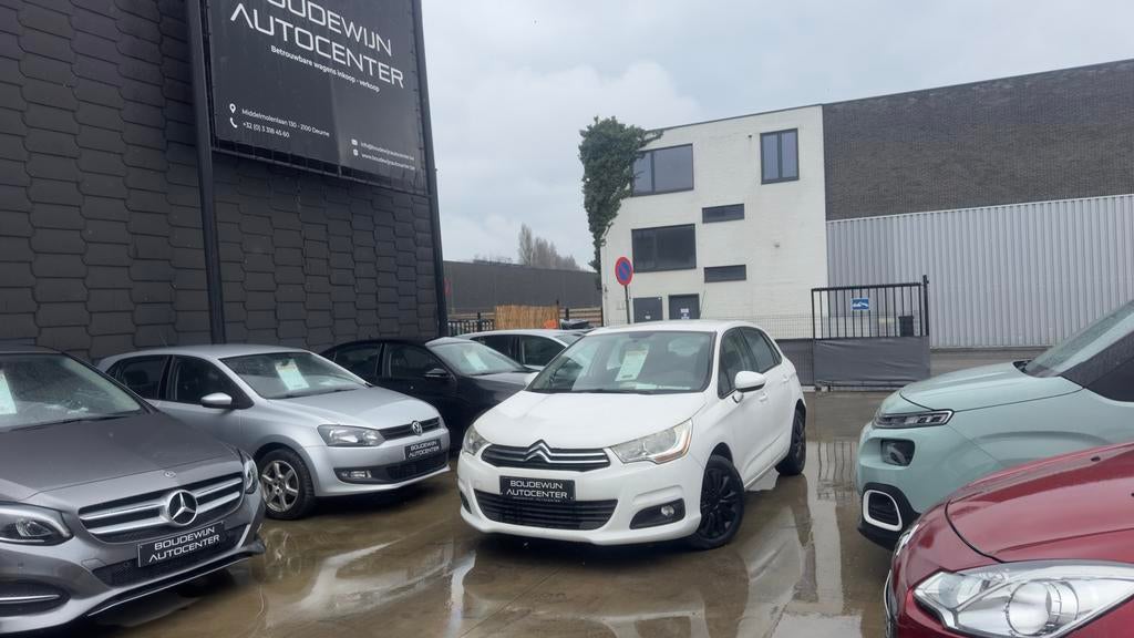 Citroën C4 1.4Benzine 2012 151.xxxkm/Airco,Cruisecontol, Auto's, Voorwielaandrijving, Stof, Zwart, Wit