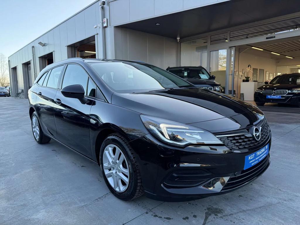 Opel Astra 1.2i TOURER NAVIGATIE CAMERA CARPLAY DAB PDC LED, Auto's, Stof, Gebruikt, 1199 cc, Zwart