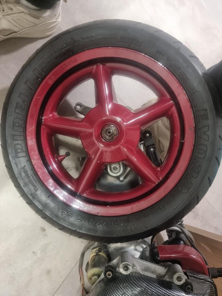 Pneu Booster Spirit Pirelli Evo 22 pour roue arrière de 12po, Vélos & Vélomoteurs, Enlèvement ou Envoi, Utilisé, Autres types