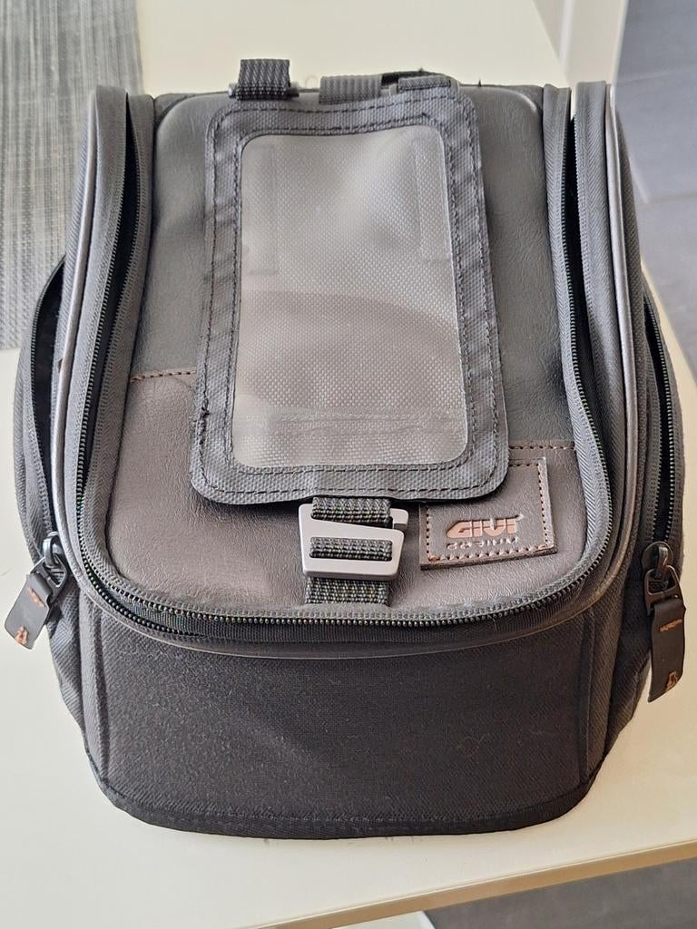 Tanktas met tanklock, Motoren, Ophalen