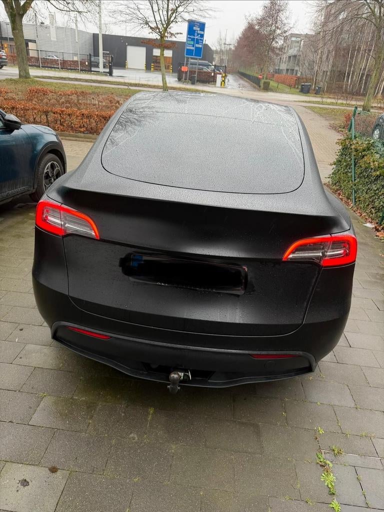 Tesla model y, Ophalen