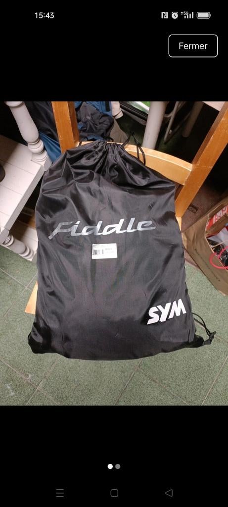 Tablier - protège jambes Sym Fiddle, Enlèvement