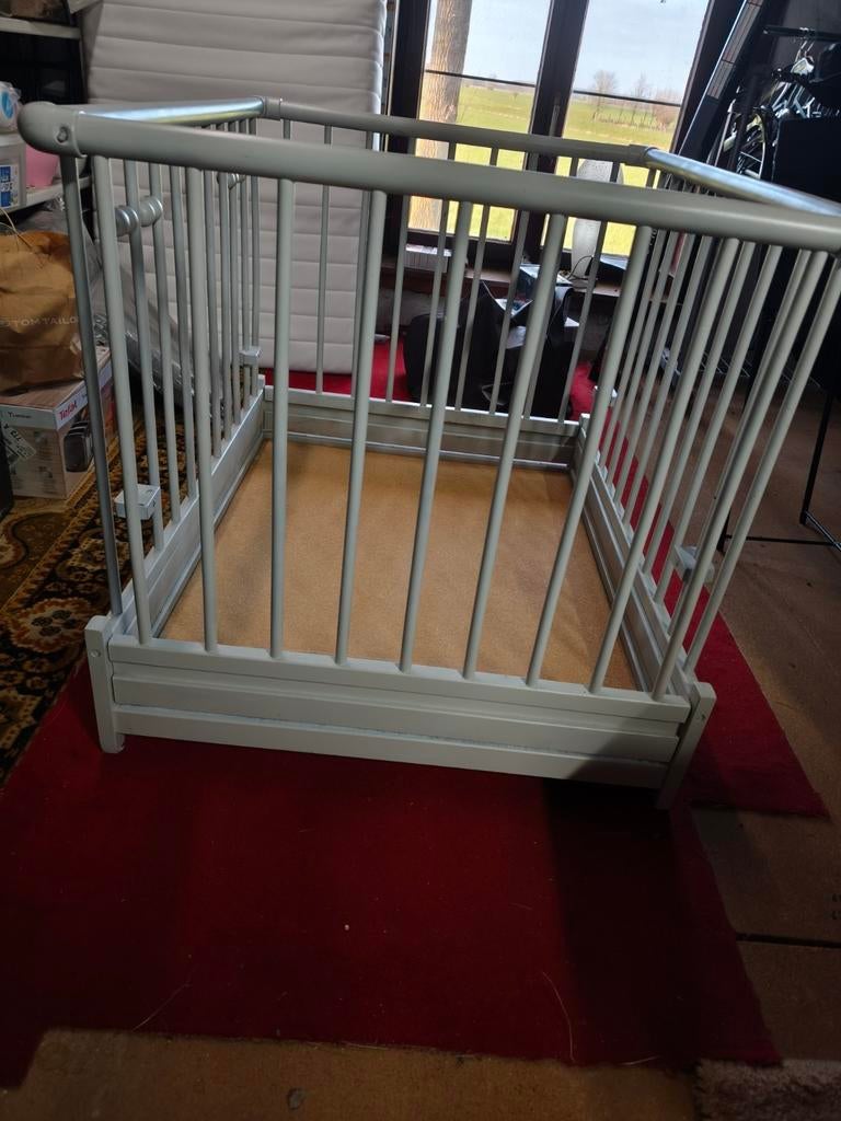 Houtenpark met matras en bekleding, Enlèvement