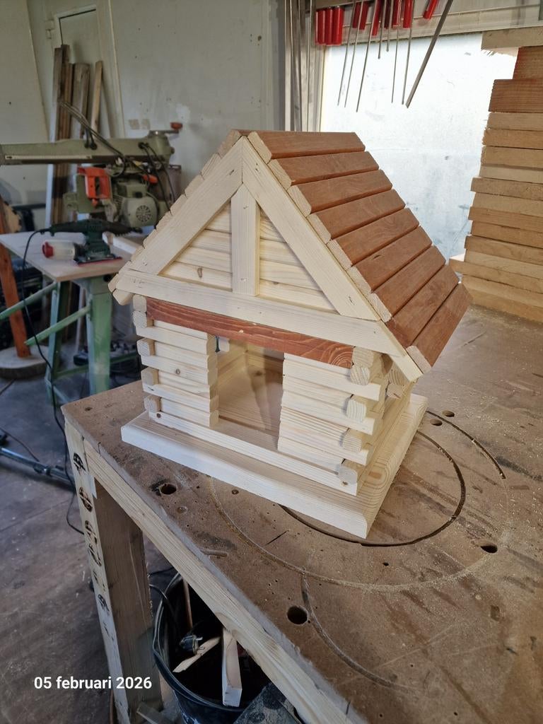 Vogel voederhuisje ( blokhut model), Ophalen