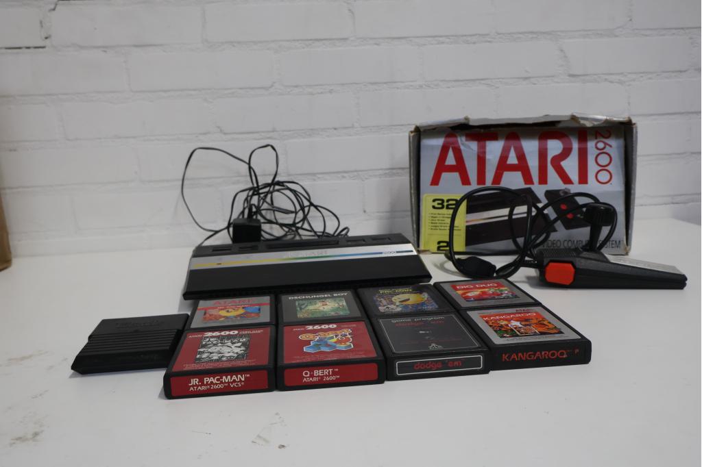 Vintage Atari 2600 Gameconsole met 8 Spellen, Ophalen of Verzenden, Niet ingevuld, Niet ingevuld, Niet ingevuld