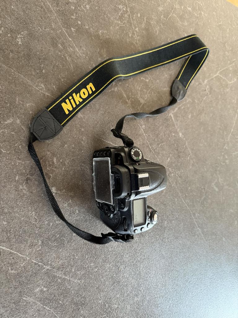 NiKon D90 parfait état avec objectif NiKon DX 18-200mm + sac, Audio, Tv en Foto, Fotocamera's Digitaal, Ophalen, Gebruikt, Nikon