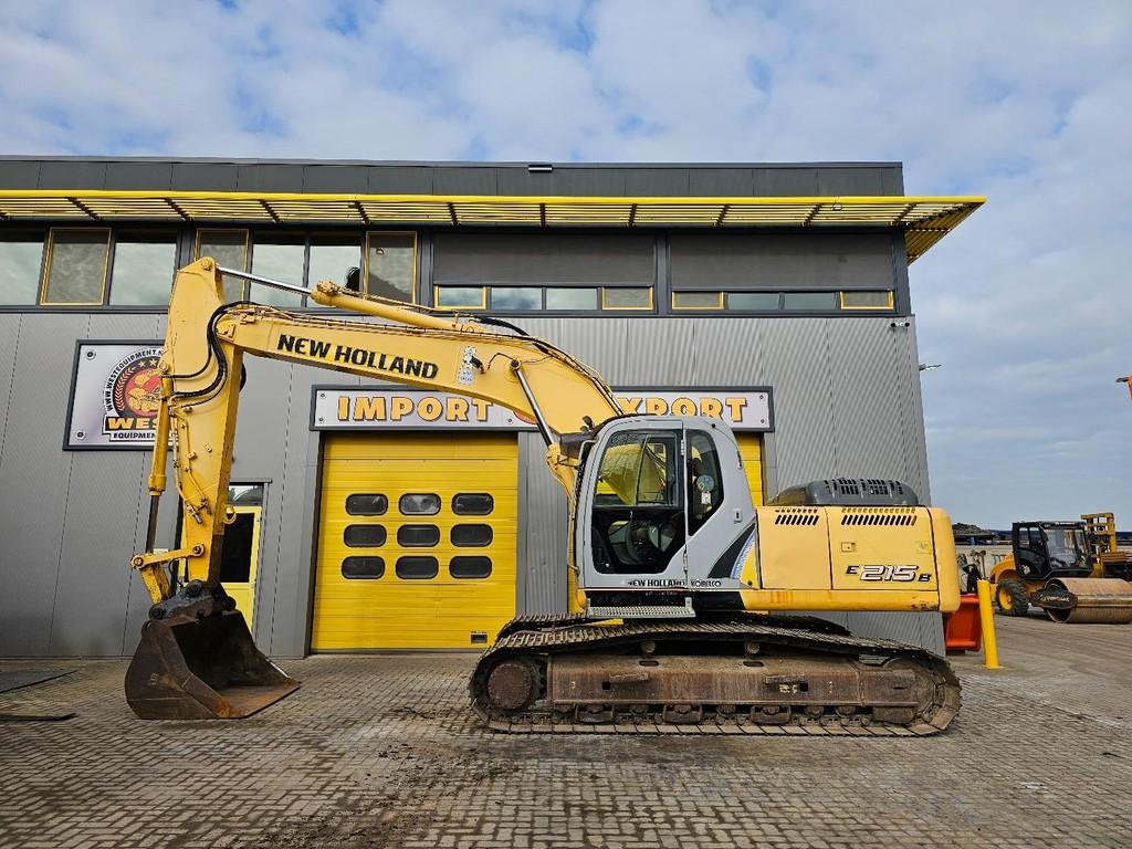 New Holland E215B * Faible nombre d'heures * WE1654, Articles professionnels, Machines & Construction | Grues & Excavatrices, Excavatrice
