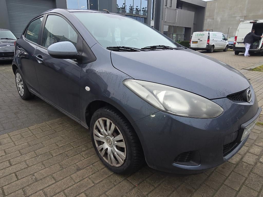 Mazda 2 1.4d 2009 205.000 km Airco Export, Auto's, Mazda, 50 kW, Zwart, Blauw, Bedrijf