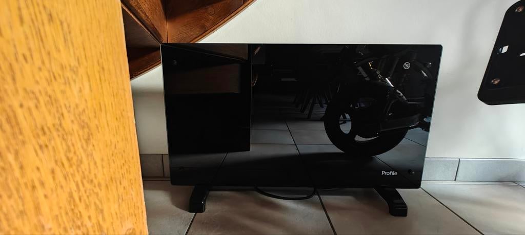 Electrisch vuurtje van profile, Enlèvement